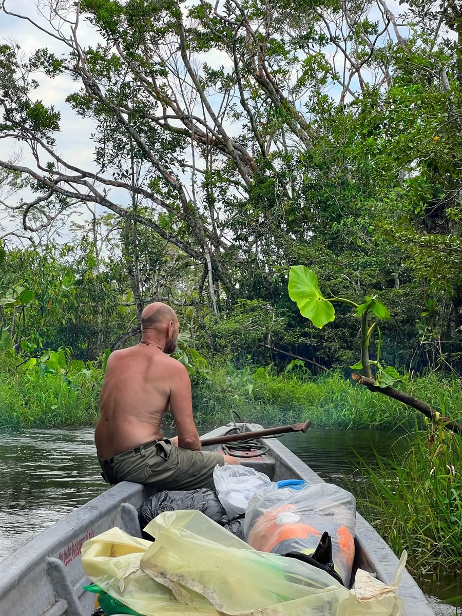 Exploring a jungle creek by canoe